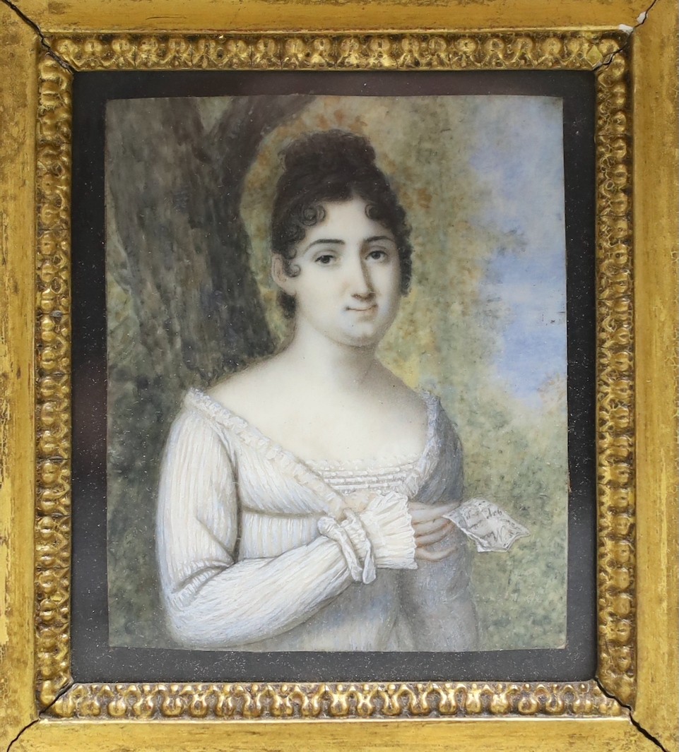 19th century English School, watercolour on ivory, Miniature of a lady holding a letter, 7 x 5.75cm